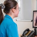 A Dietician using video conferencing online